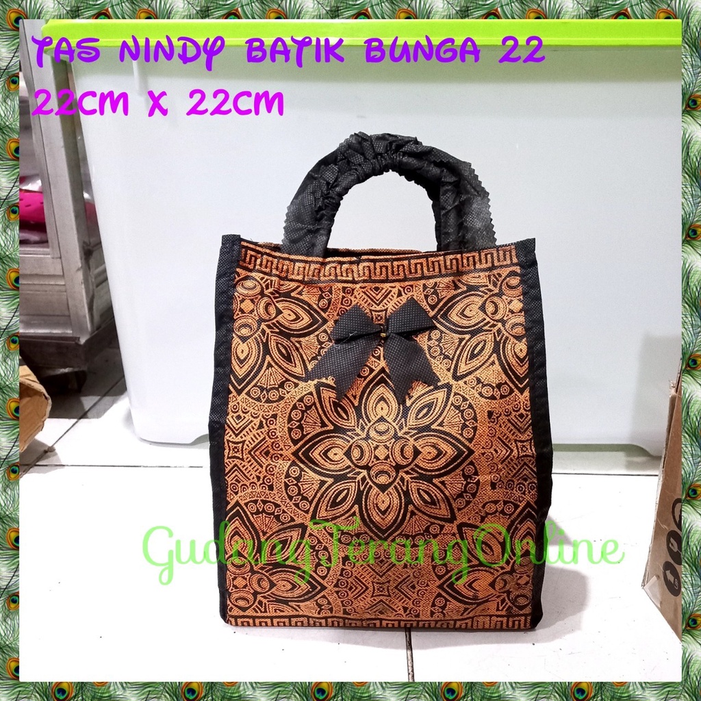 

tas hajatan spunbond nindy batik bunga 22 lusinan