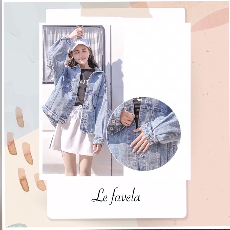 JAKET JEANS WANITA IMPORT CLARIS / dengan Model Potongan Asimetris dan Hiasan Saku Ukuran Besar.