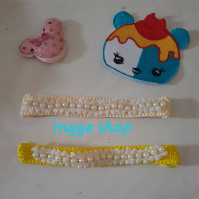 Konektor masker rajut mutiara