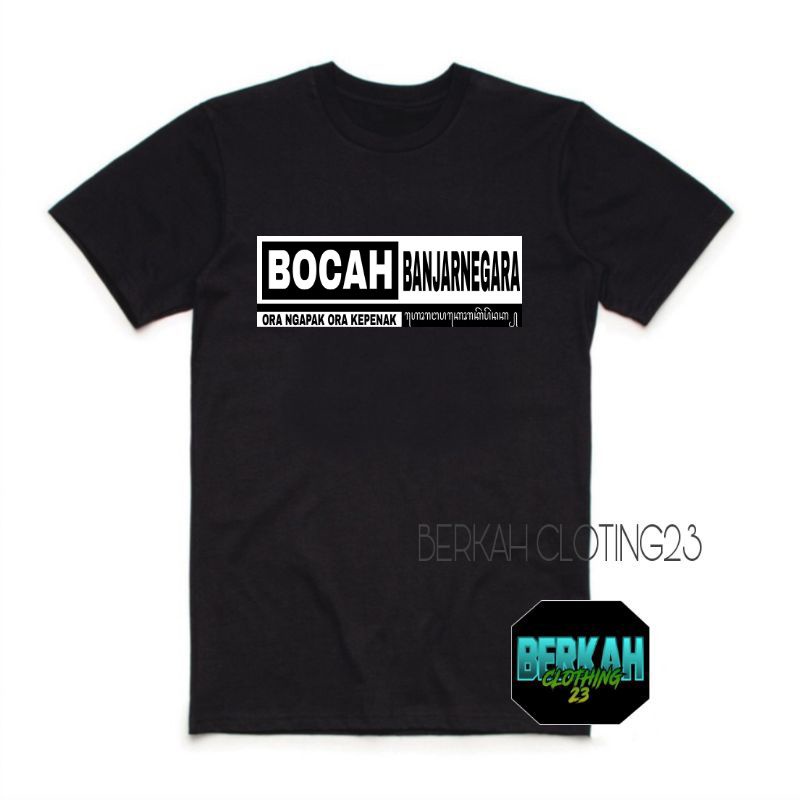 Kaos baju bocah Banjarnegara ora ngapak ora kepenak aksara jawa