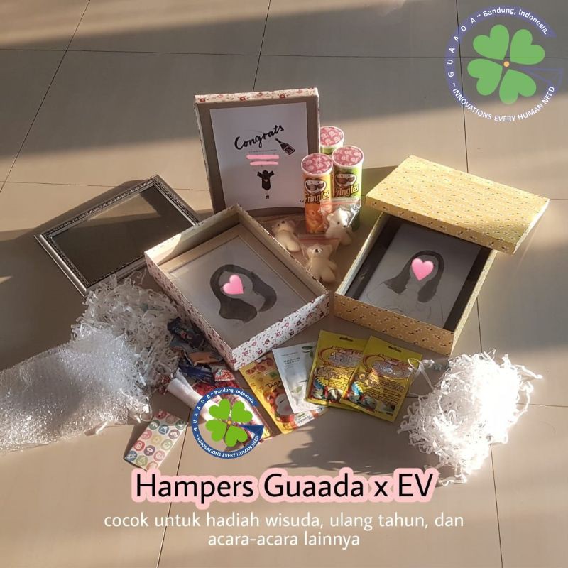 

Hampers Wisuda/ Hadiah UlangTahun Guaada x EV Lukisan Pensil+IG story, Snack box, Gratis Konsultasi