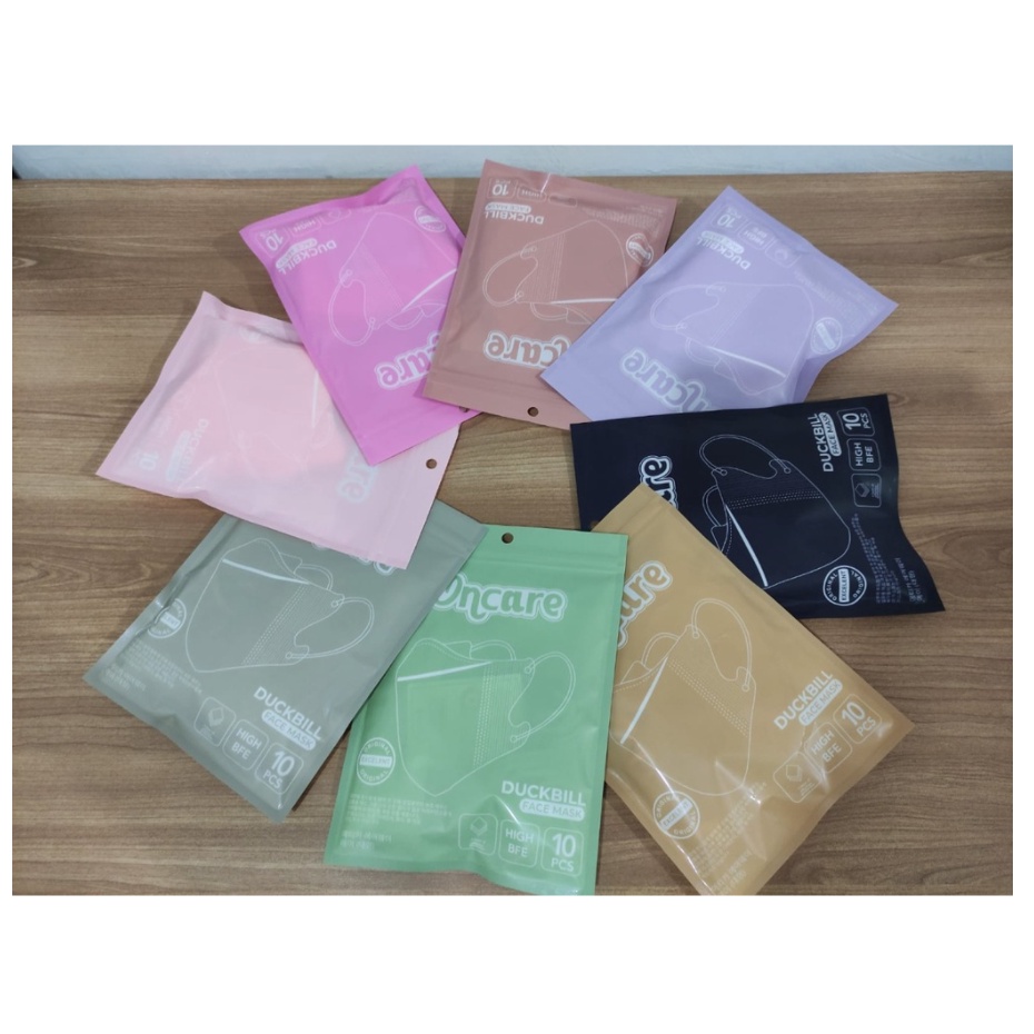 MASKER DUCKBILL WARNA ON CARE 3 PLY ISI 10 PCS