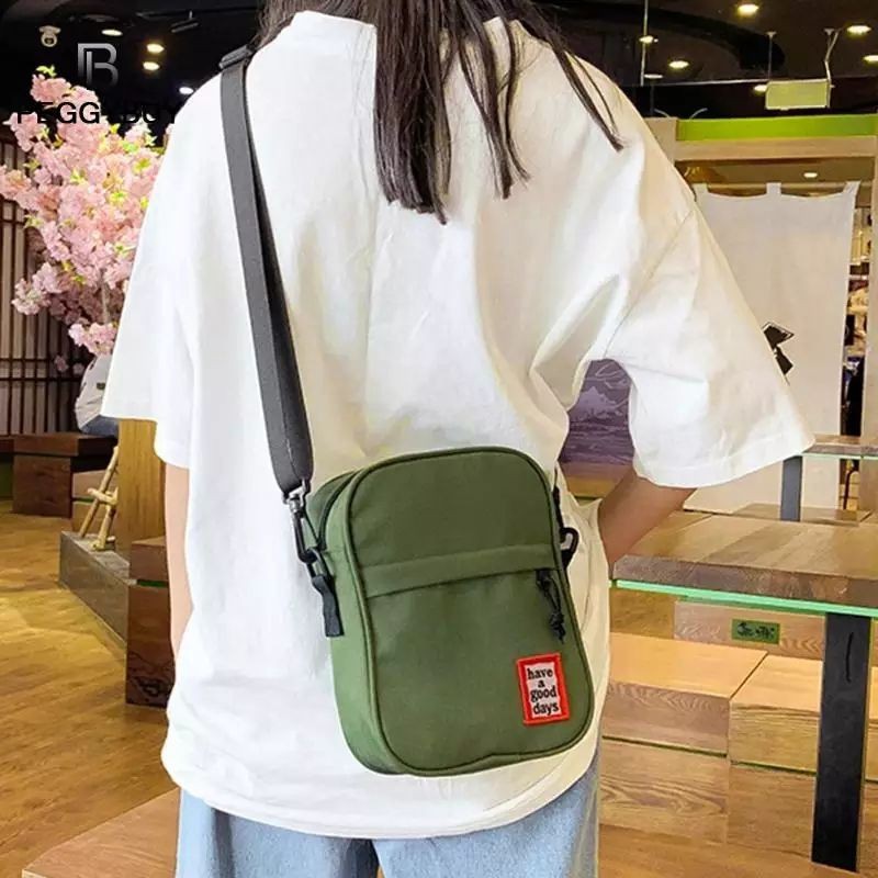 tas selempang wanita model simple hitam dan hijau ready stok foto real