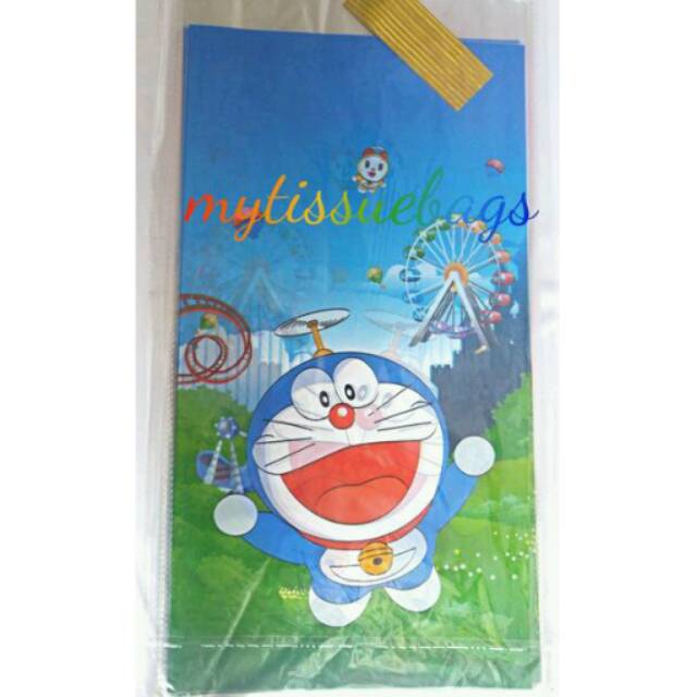 

Souvenir ulang tahun/plastik snack doraemon 25x50