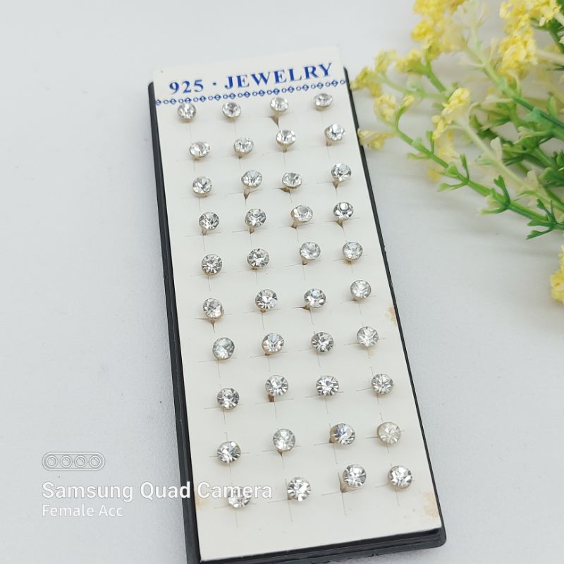 Anting tindik plastik, permata putih