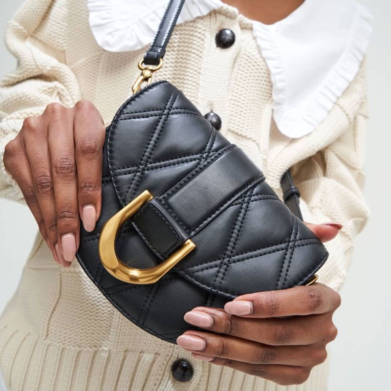 CK Mini Gabine Quilted Saddle Bag