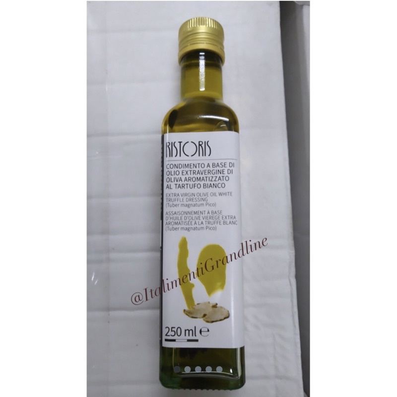 

truffle oil with truffle flakes