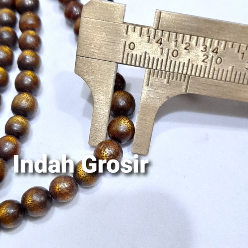 Tasbih Kayu Tali Arus Serat mas 7mm 99butir original