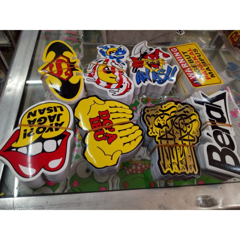 

Sticker Graftac sablon Graftac kartun,kaligrafi,macam²,warning²,kata²warna stabilo harga murah lebay