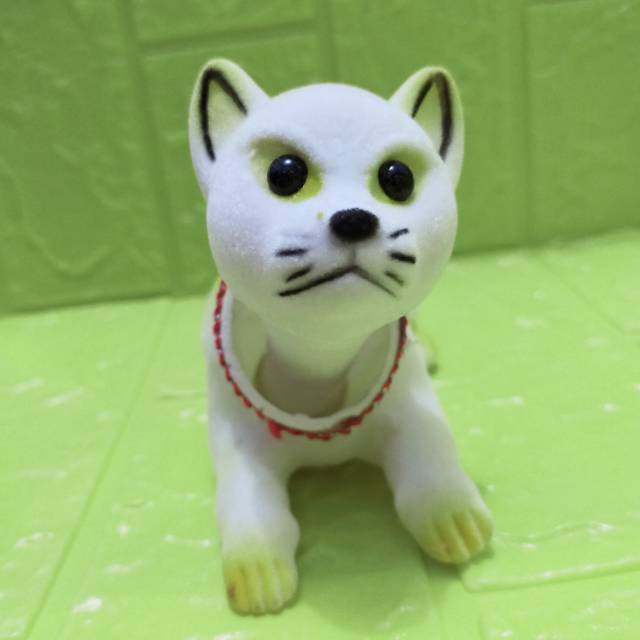 Boneka kepala goyang kucing kuning