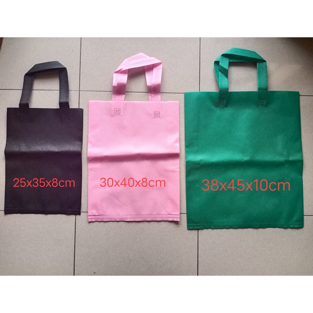 

Tas Kantong Spundbond Press Handle Tali