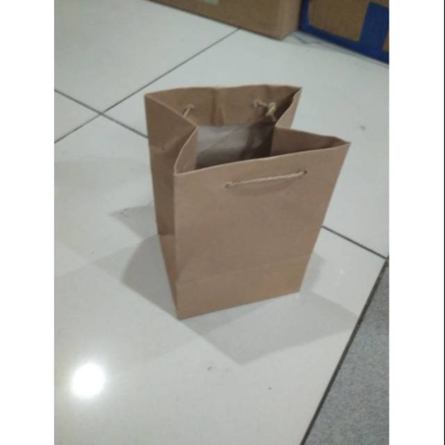 

Paper bag mug polos terlaris dan murah isi 12 pcs