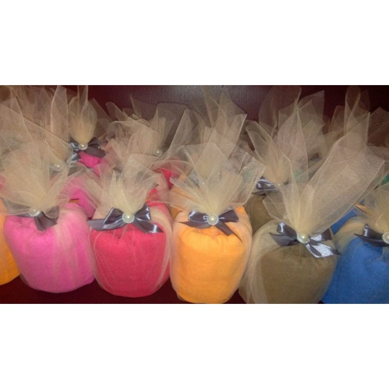 Handuk Merk Merah Putih packing tile cantik untuk souvenir