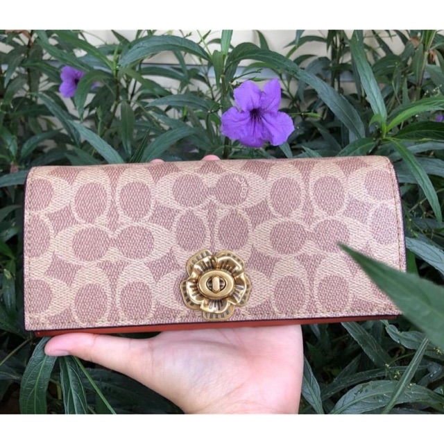 Coach wallet with flower unlock