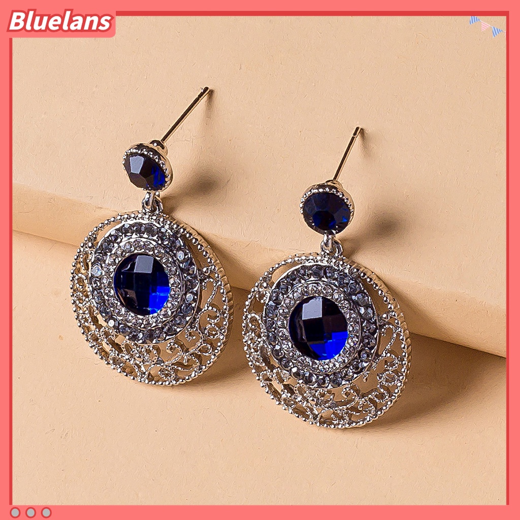 Anting Stud Bentuk Bulat Hollow Aksen Berlian Imitasi Warna Biru Untuk Wanita
