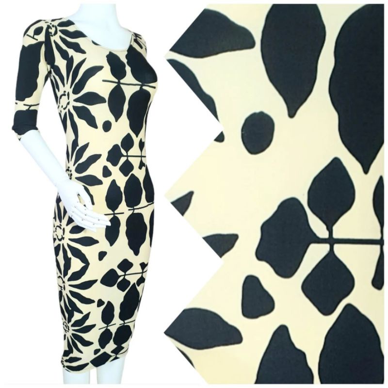 midi dress cream motif hitam