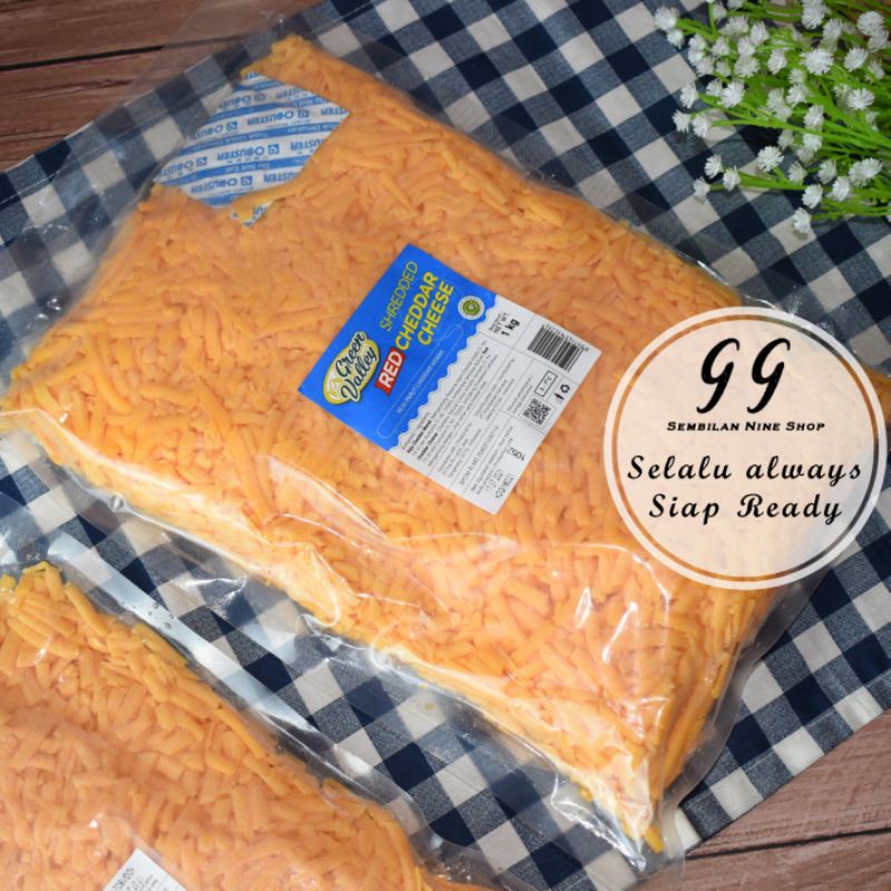 

SHREDDED RED CHEDDAR Cheese Green Valley 1 KG Keju Parut Merah