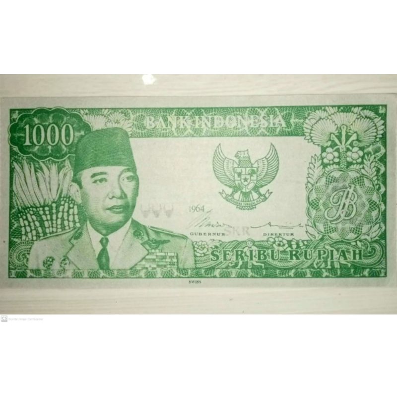 EDISI KHUSUS Uang 1.000 Soekarno Tahun 1964 Uang Sukarno Menggulung Diatas Air Es Uang 1000 Soekarno