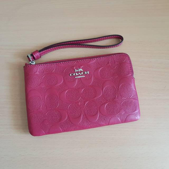 Coach wristlet hot pink embossed