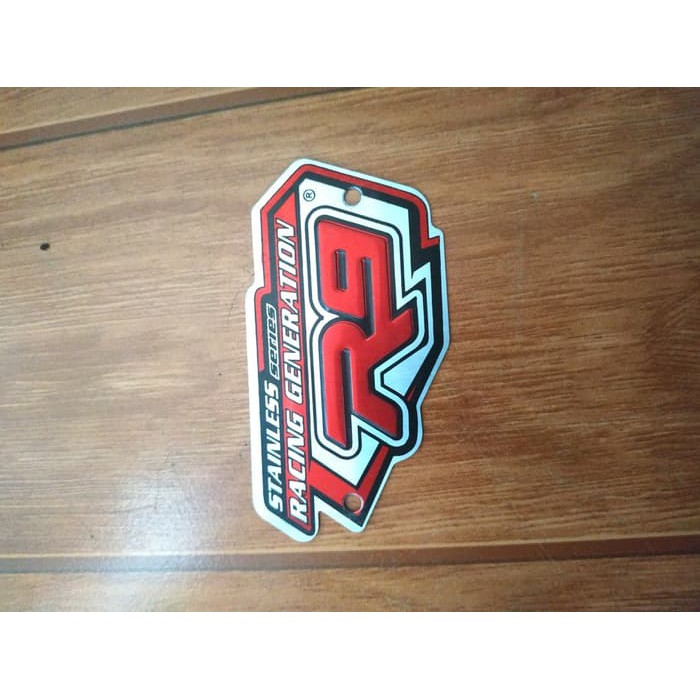 EMBLEM KNALPOT R9 NEW MUGELO
