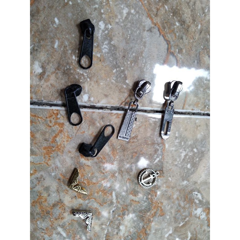 kepala resleting besi rip