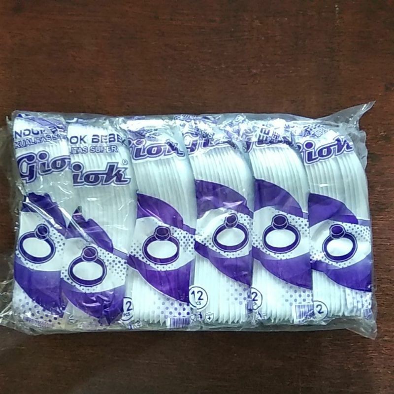 Sendok bebek merek giok warna putih susu