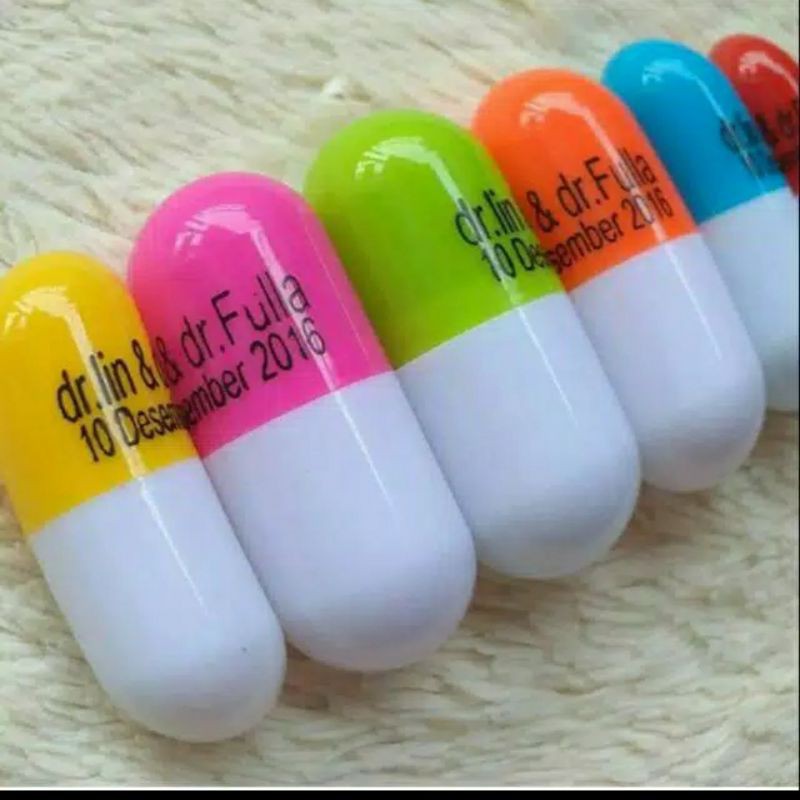

Souvenir pernikahan pena kapsul kemasan pelastik + sablon nama