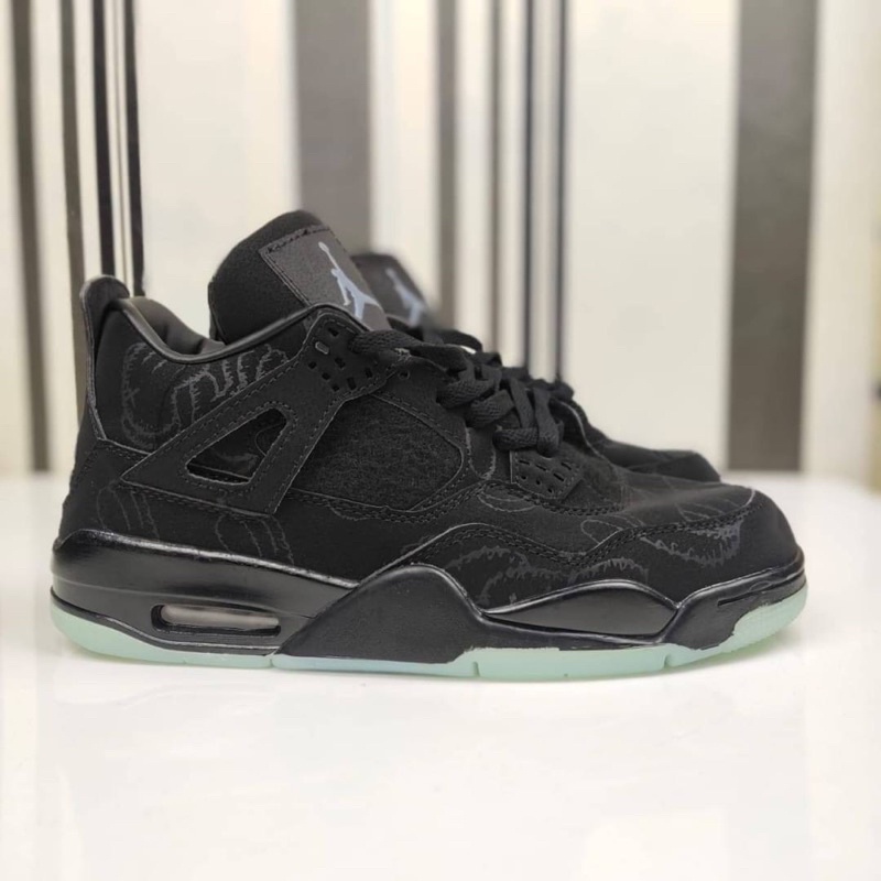 nike aj4 kaws