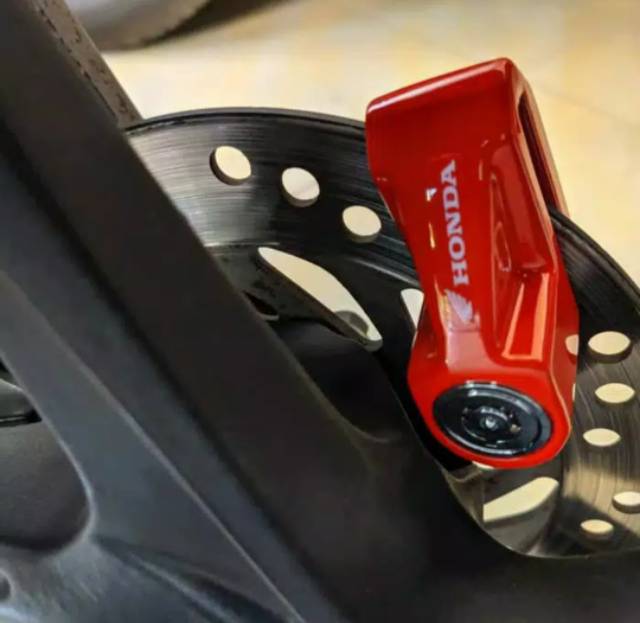 GEMBOK CAKRAM MOTOR ORIGINAL HONDA AHM 100%.-1