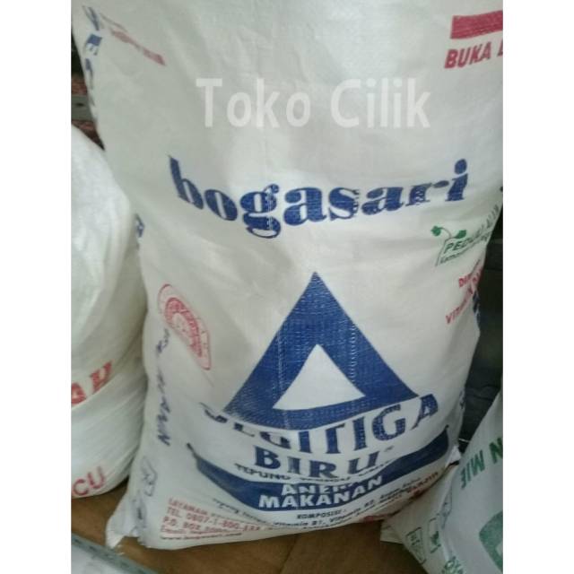 

tepung/terigu/segitiga/curah/bogasari/protein rendah/bahan/roti/donat