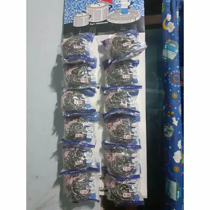 Grenjeng gosok panci honaga