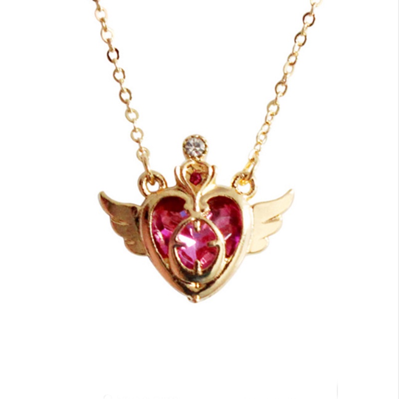 Kalung Rantai Klavikula Hias Liontin Sayap Malaikat Hati Kristal Warna Emas Bahan Alloy Untuk Wanita