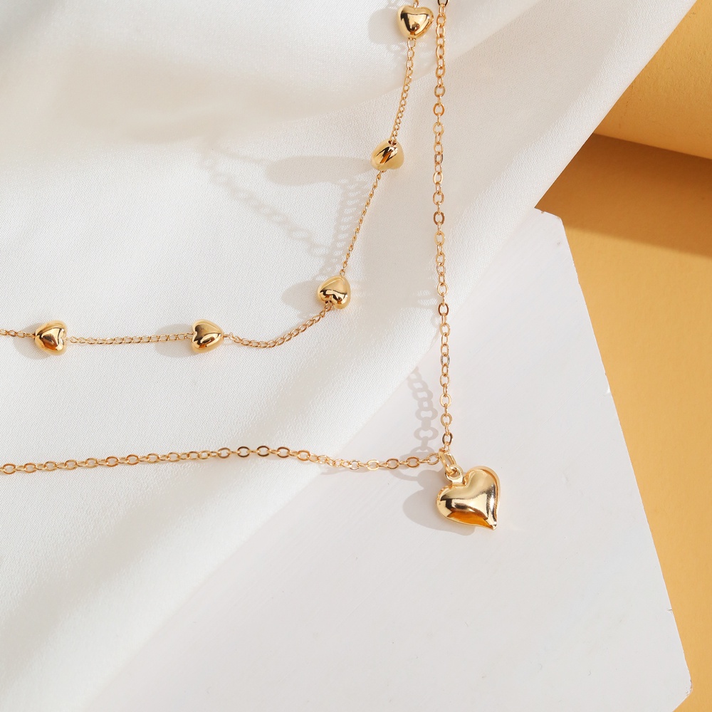 Kalung Rantai Panjang Multilayer Liontin Hati Warna Emas Gaya Bohemia Untuk Wanita