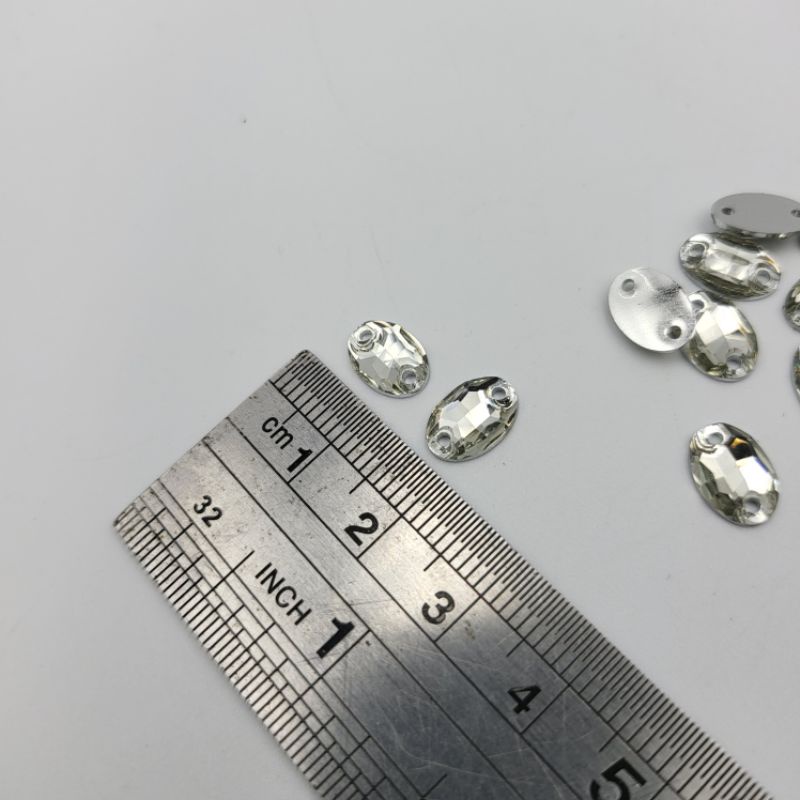 DIAMON RESIN KRISTAL MOTIF OVAL RATA UKURAN 7X10 WARNA PUTIH BERSIH KUALITAS AA KILAU BAGUS PER LUSIN