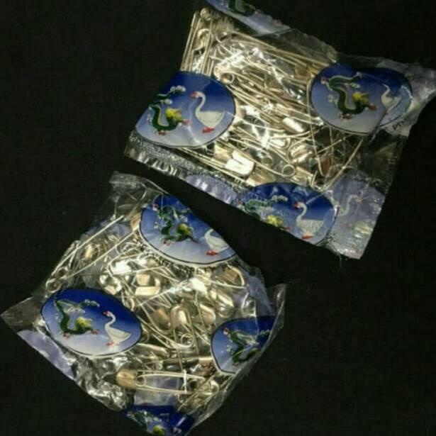 

ポ PENITI SWANAGA 1 DUS ⇤