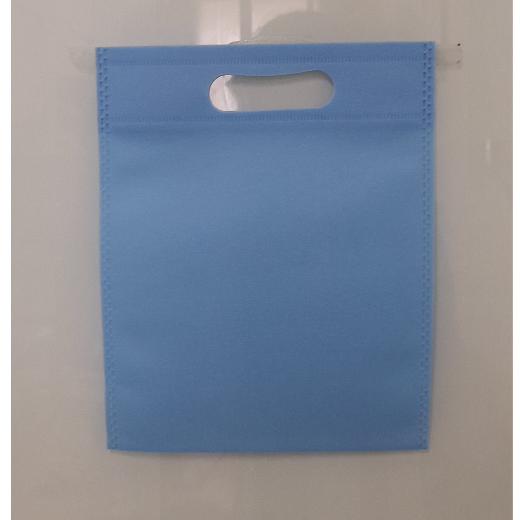 

Tas Press Spunbound Oval Goodie Bag Tas Belanja Warna Biru Baby Blue 20 cm x 25 cm