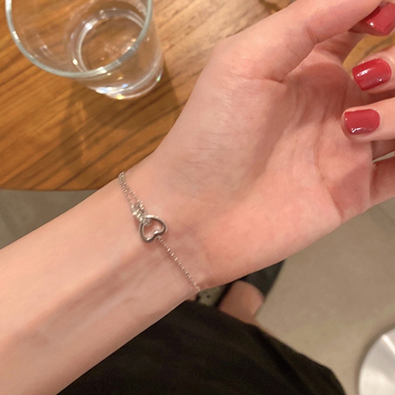 Gelang Tangan Rantai Alloy Silver Desain Hati Ganda Hollow Hias Berlian Imitasi Gaya Korea Untuk Wanita