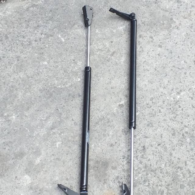 Shock bagasi belakang Luxio