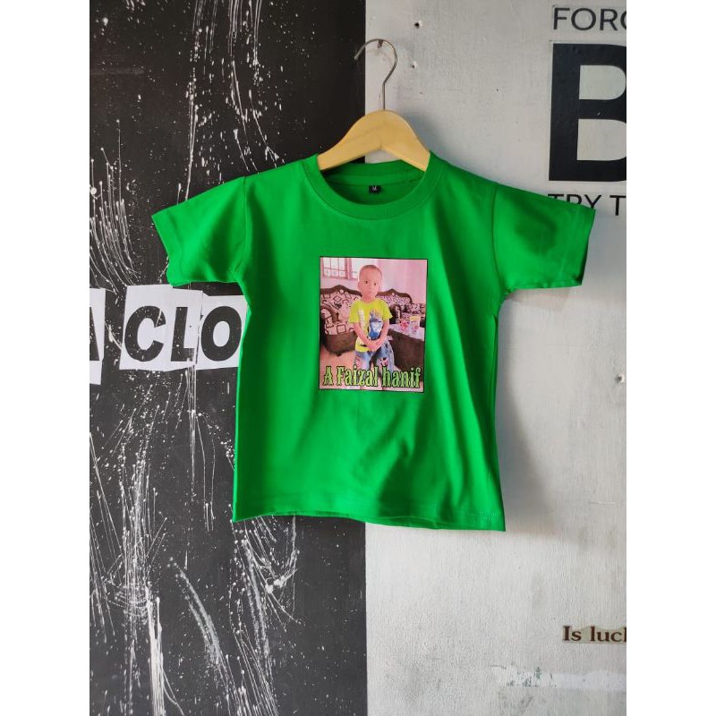 Kaos untuk anak dengan design foto atw karakter kartun favorit di sertai nama