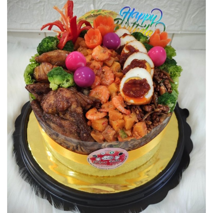 

Tumpeng cake ulang tahun/ nasi kuning/ nasi uduk