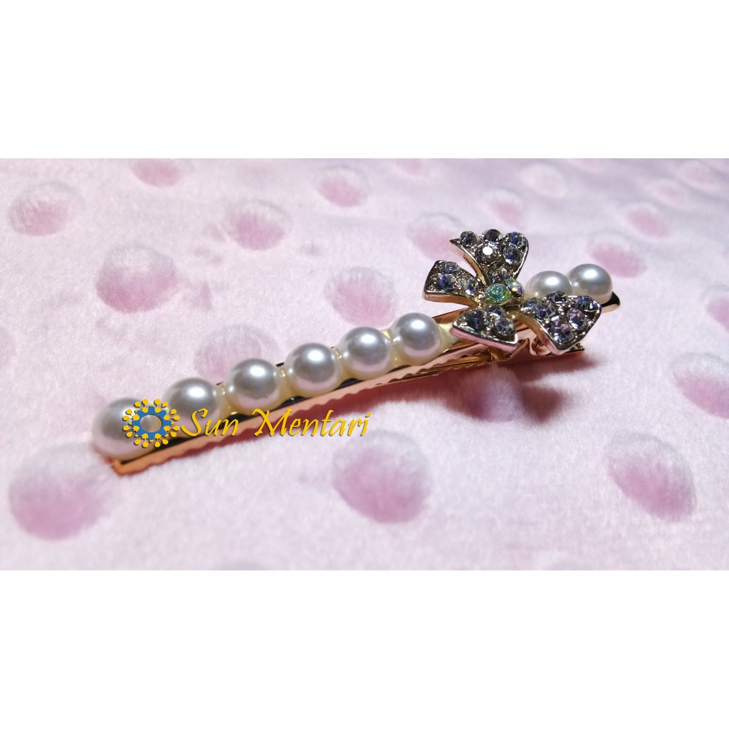 Jepitan Rambut Pita Gold Mutiara Diamond