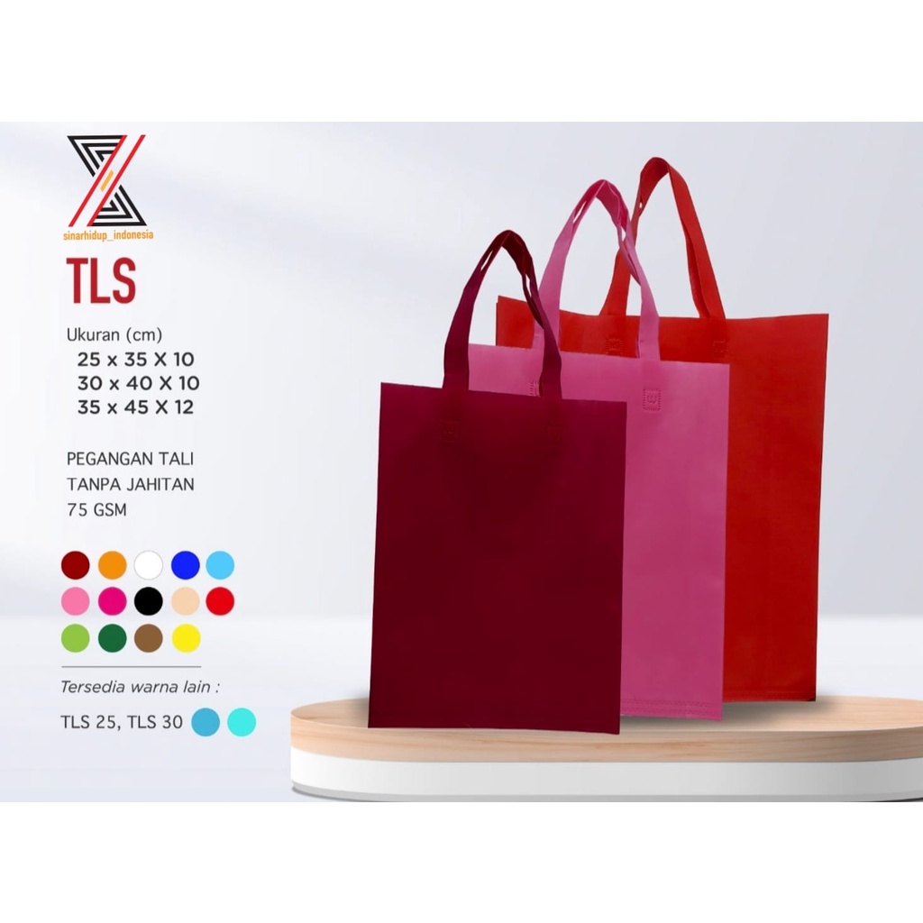 

Goodie Bag Tls 38 x 45 Spunbond Tote Bag Press Tali Sourvenir Weding Hajatan Perlusin ( 12 Pcs )