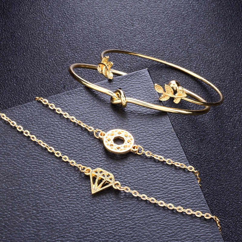 4pcs / Set Gelang Rantai Bentuk Daun Simpul Warna Rose Gold Untuk Wanita