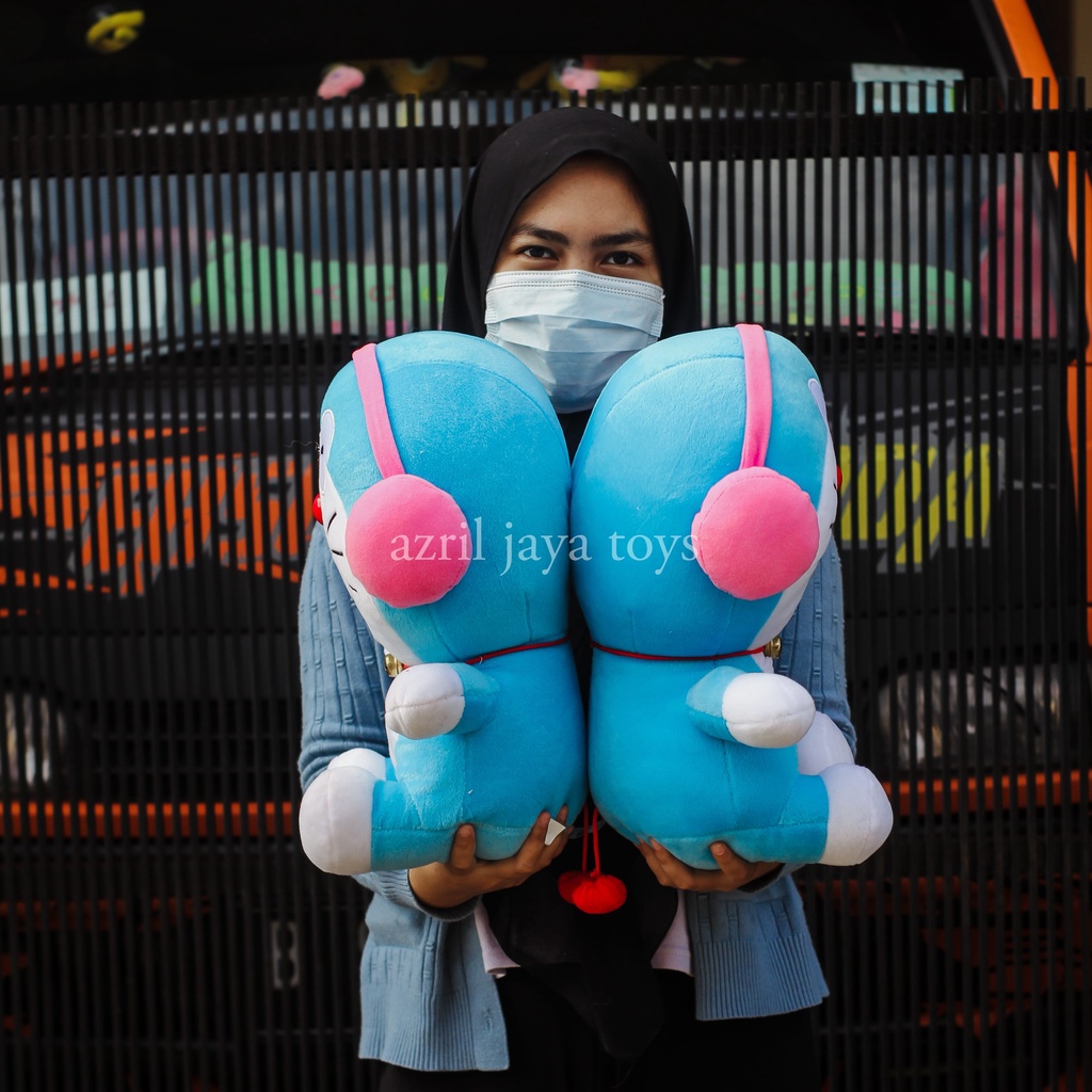 Boneka Doraemon Terbaru Lucu dan Imut pake Headshet Pink