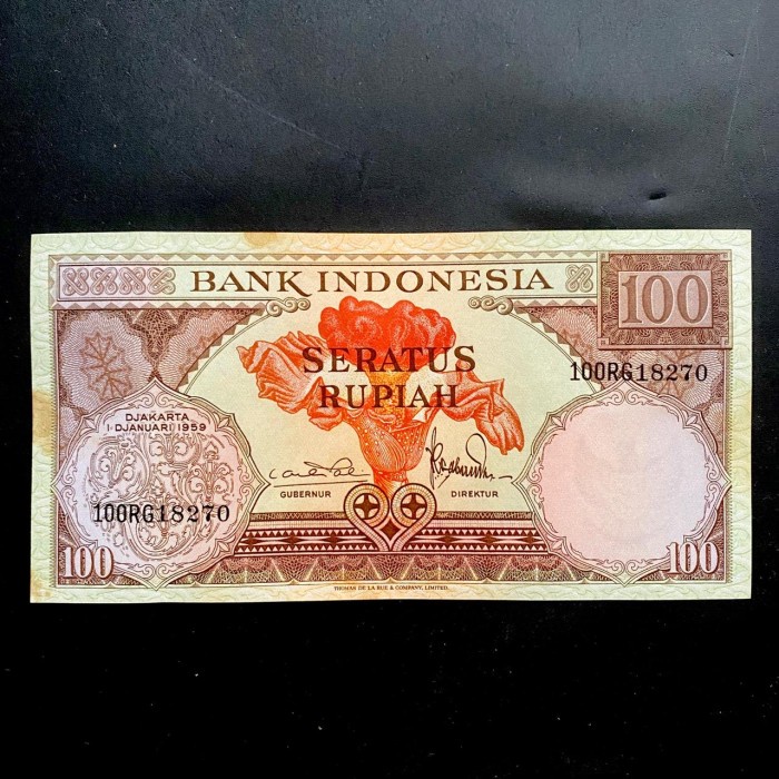 KUNO-UANG- UANG KUNO INDONESIA 100 RUPIAH BUNGA UNC FOXING (LIHAT FOTO) -UANG-KUNO.