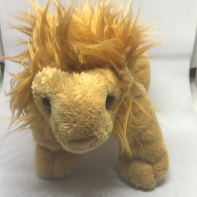 Boneka singa taman safari