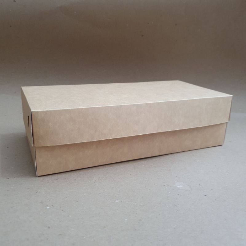 

Kardus Dus Box Kotak Kue Cake Roti Bolu Brownies 25x12x7 muat 2 toples bulat 250gr