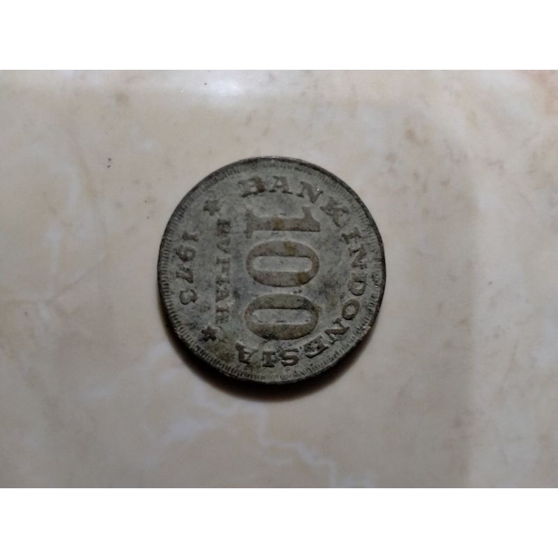 Uang koin 100 rupiah 1973