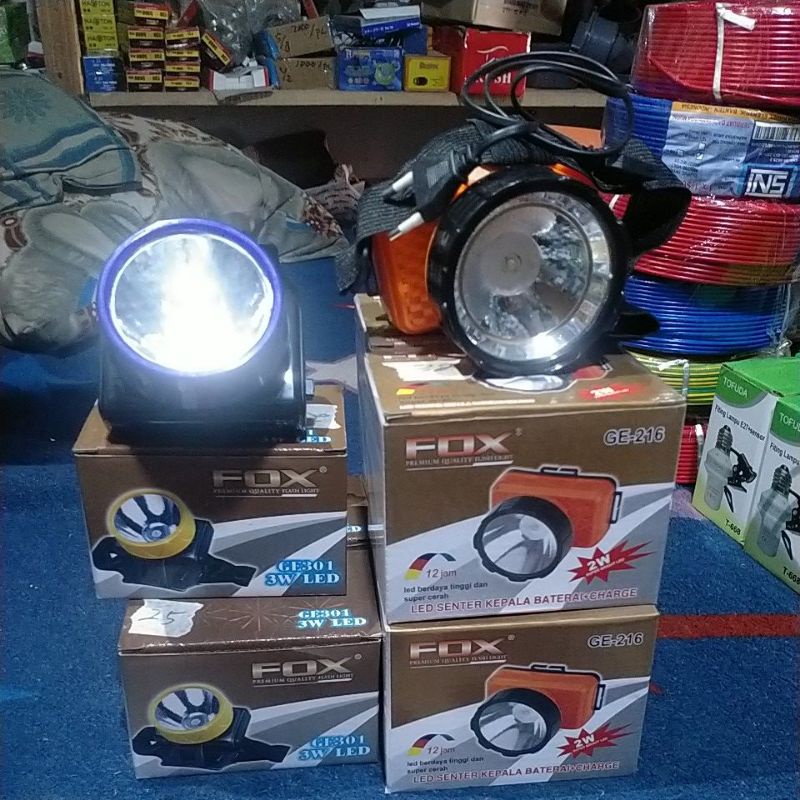 Senter LED kepala Baterai+Cas