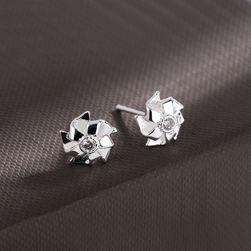 Fancyqube Anting Stud Desain Kincir Angin Keberuntungan Aksen Berlian Imitasi Warna Silver Untuk Wanita